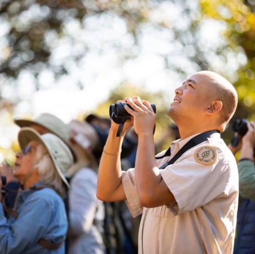 Francis looking for birds as a naturalist for the East Bay Regional Park District